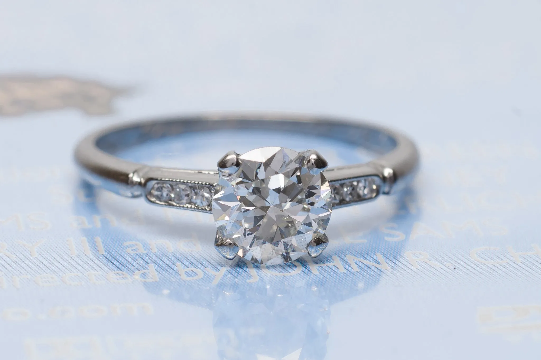 0.95CT ART DECO OLD EUROPEAN CUT DIAMOND SOLITAIRE WITH ACCENTS