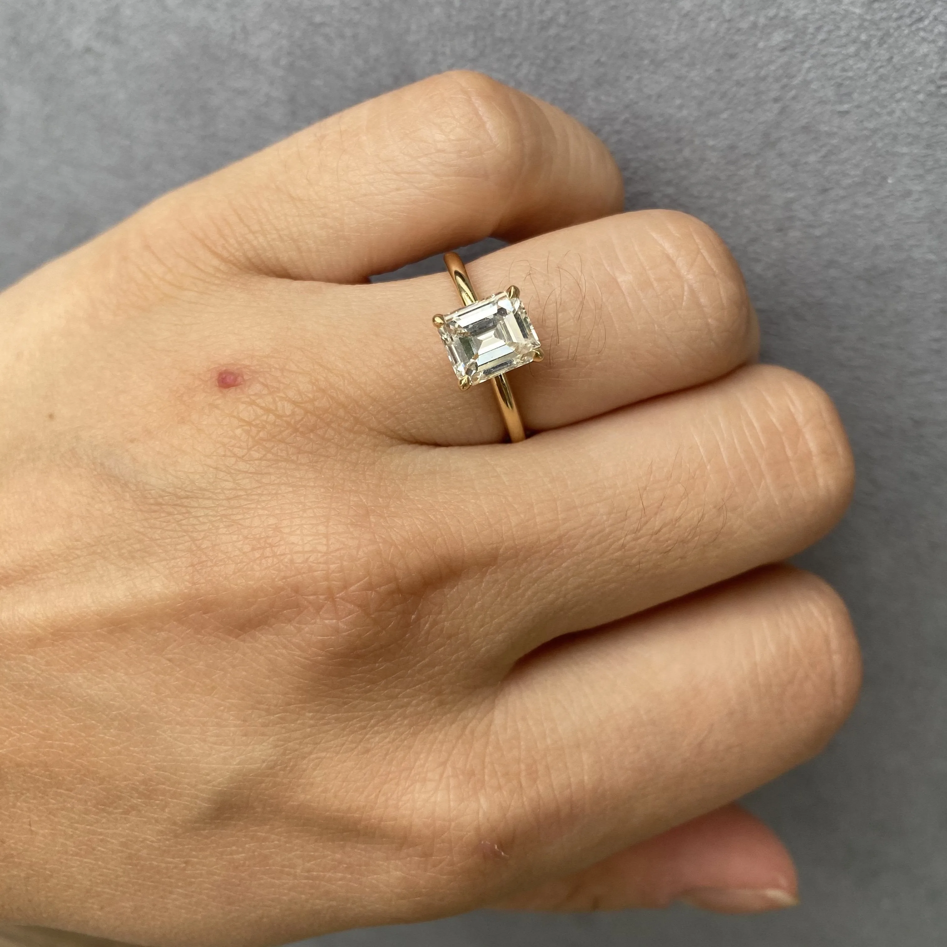 1.60CT EMERALD CUT ENGAGEMENT RING