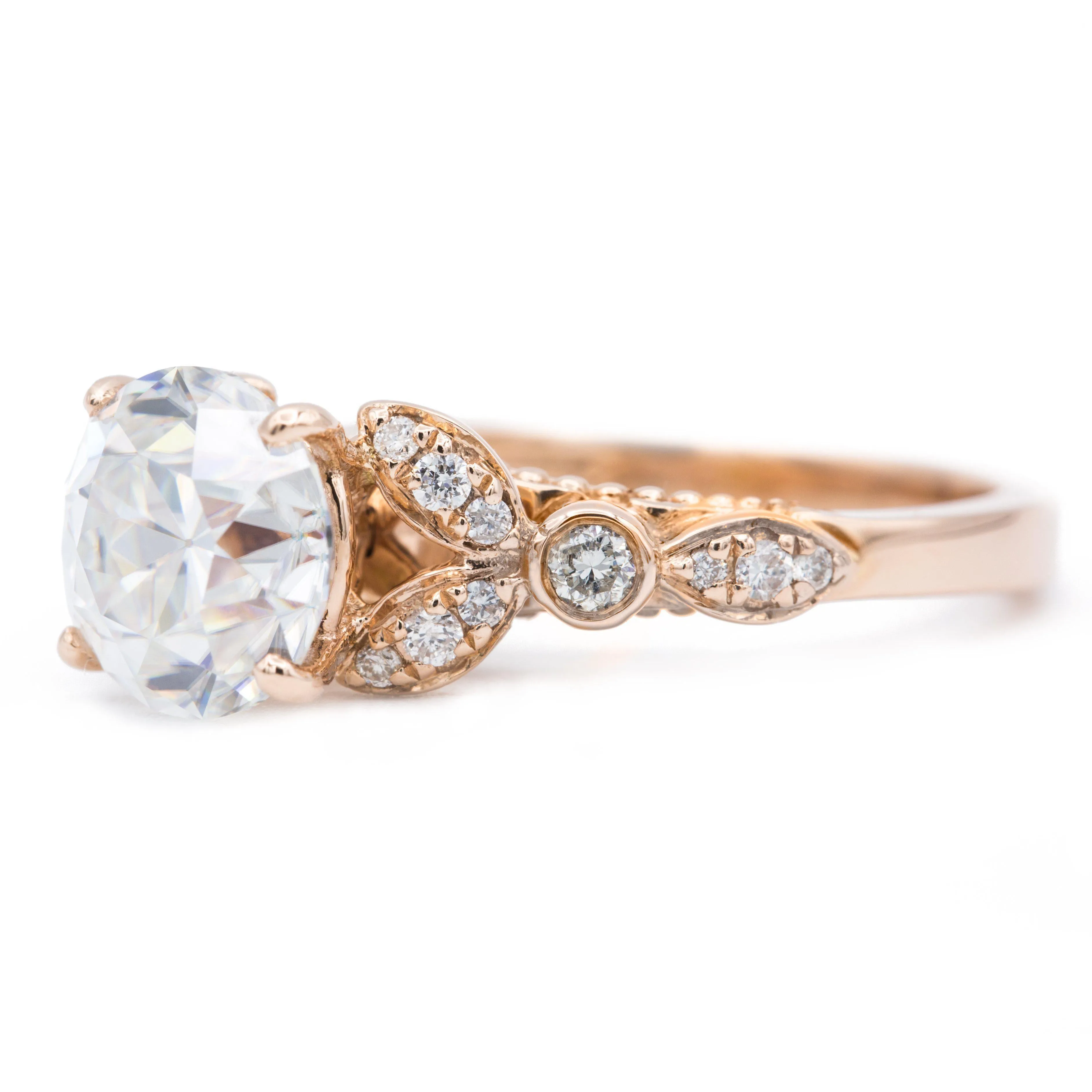 8mm Round OEC Heirloom Moissanite 14K Rose Gold Half Bead Shank and Diamond Bezel Side Ring