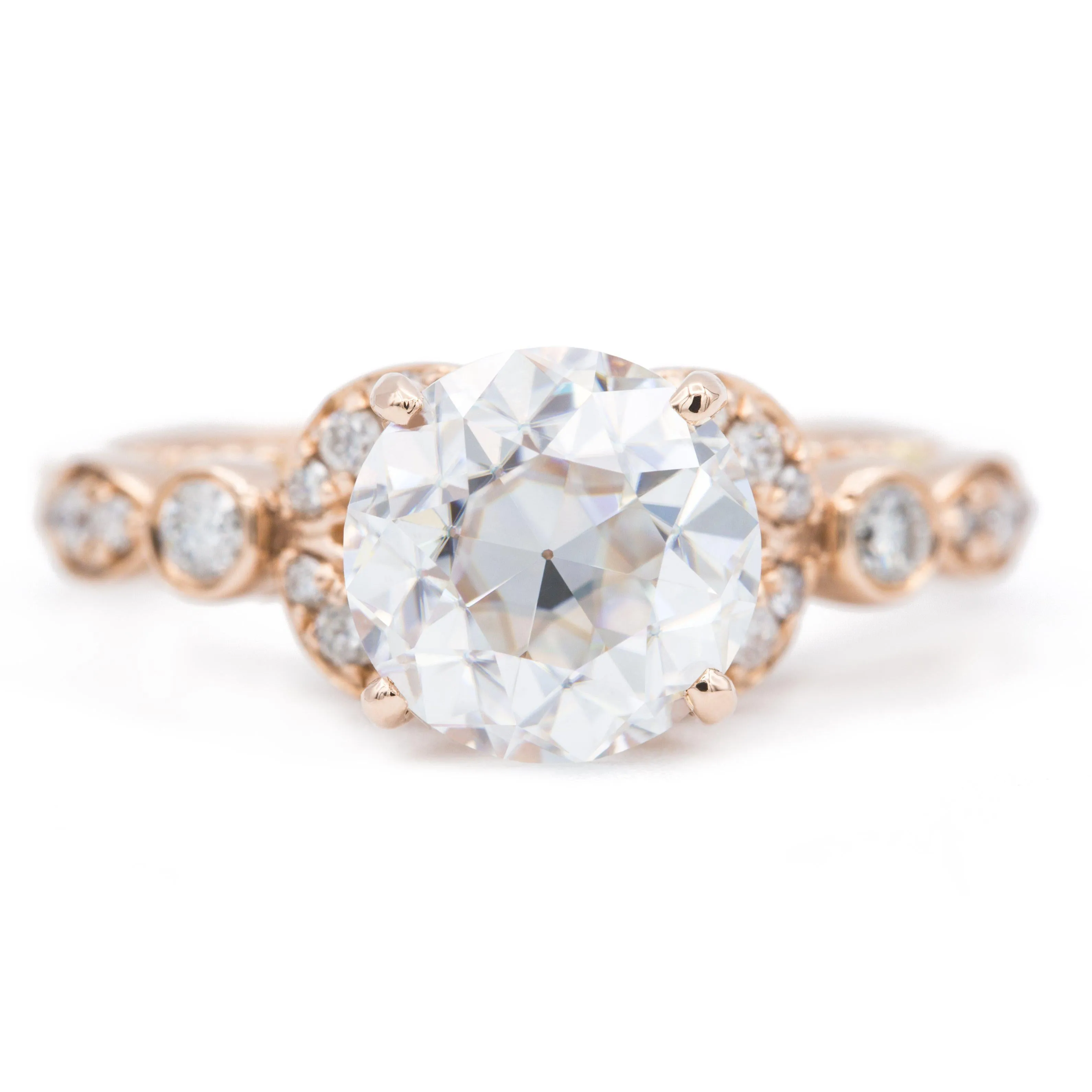 8mm Round OEC Heirloom Moissanite 14K Rose Gold Half Bead Shank and Diamond Bezel Side Ring
