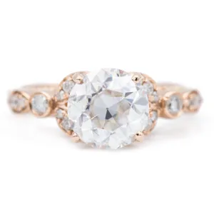 8mm Round OEC Heirloom Moissanite 14K Rose Gold Half Bead Shank and Diamond Bezel Side Ring