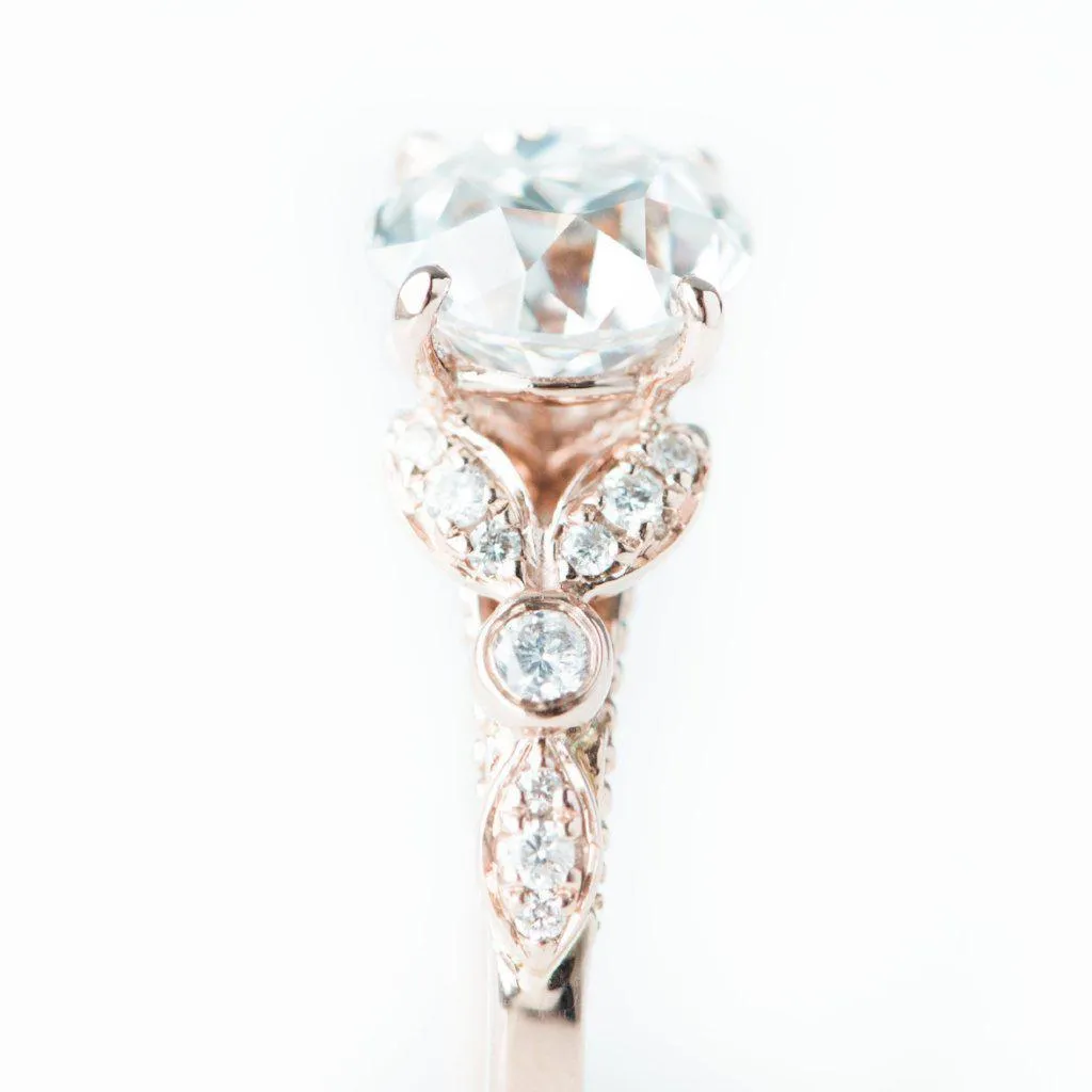 8mm Round OEC Heirloom Moissanite 14K Rose Gold Half Bead Shank and Diamond Bezel Side Ring