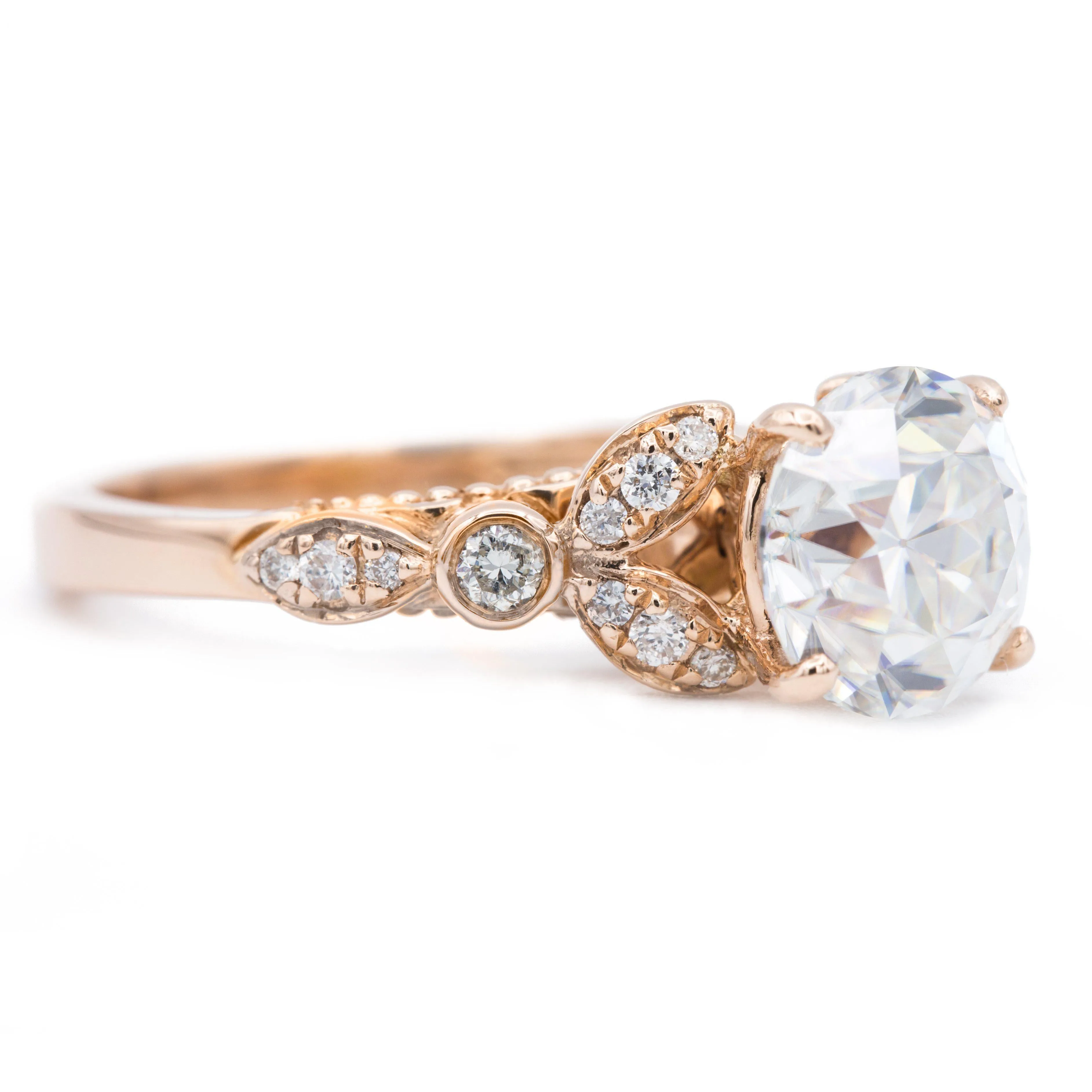 8mm Round OEC Heirloom Moissanite 14K Rose Gold Half Bead Shank and Diamond Bezel Side Ring