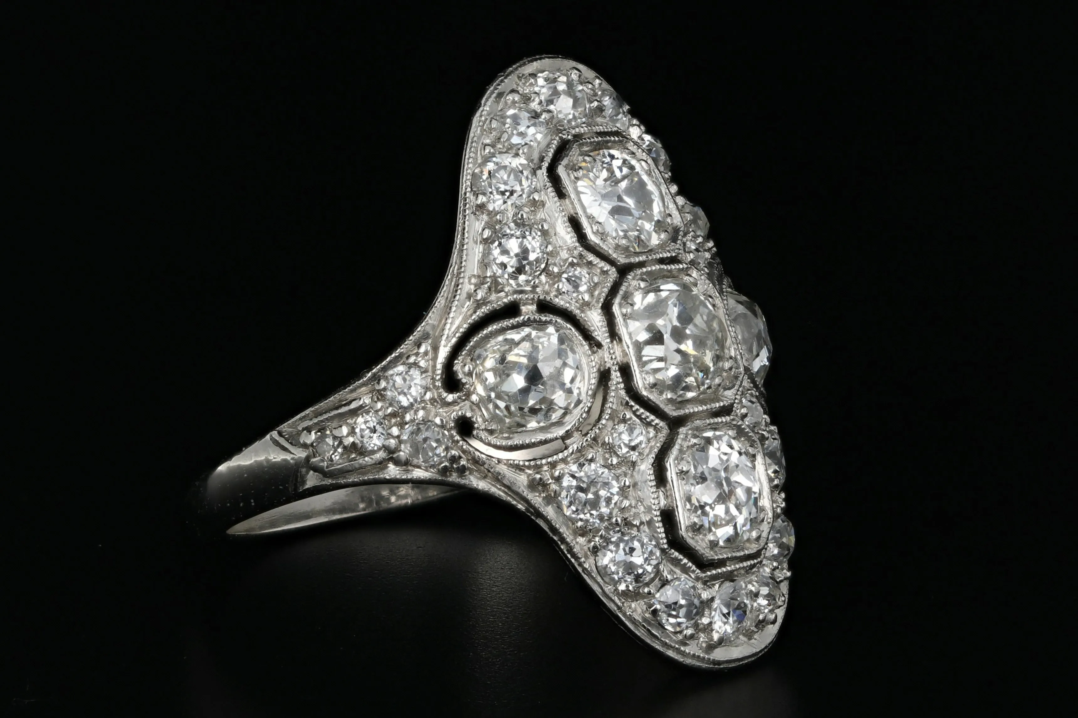 Art Deco Platinum 1.6 Carat Old European Cut Diamond Weight Total Shield Ring