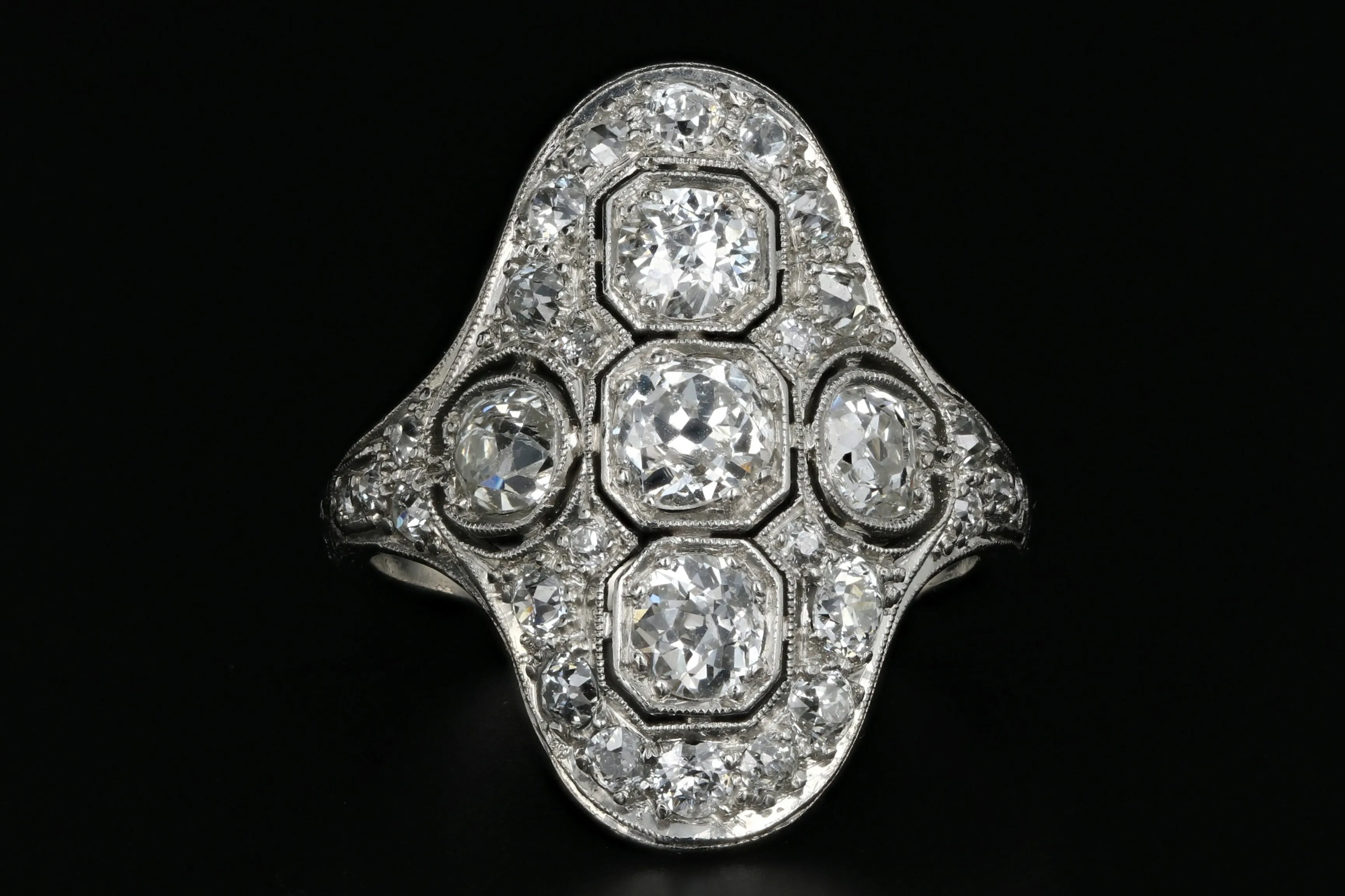 Art Deco Platinum 1.6 Carat Old European Cut Diamond Weight Total Shield Ring