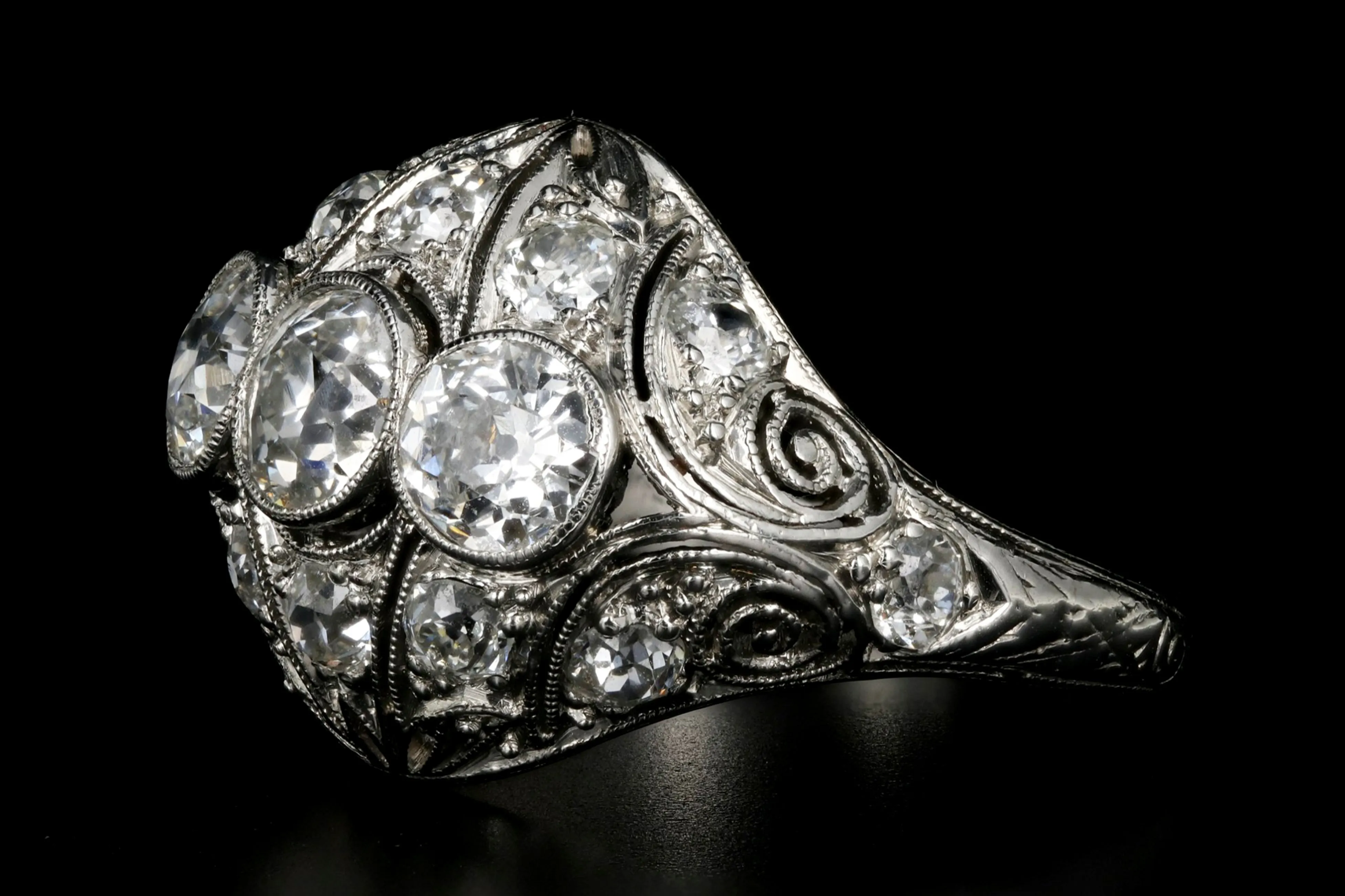 Art Deco Platinum 2.53 Carat Total Weight Three Stone Diamond Ring