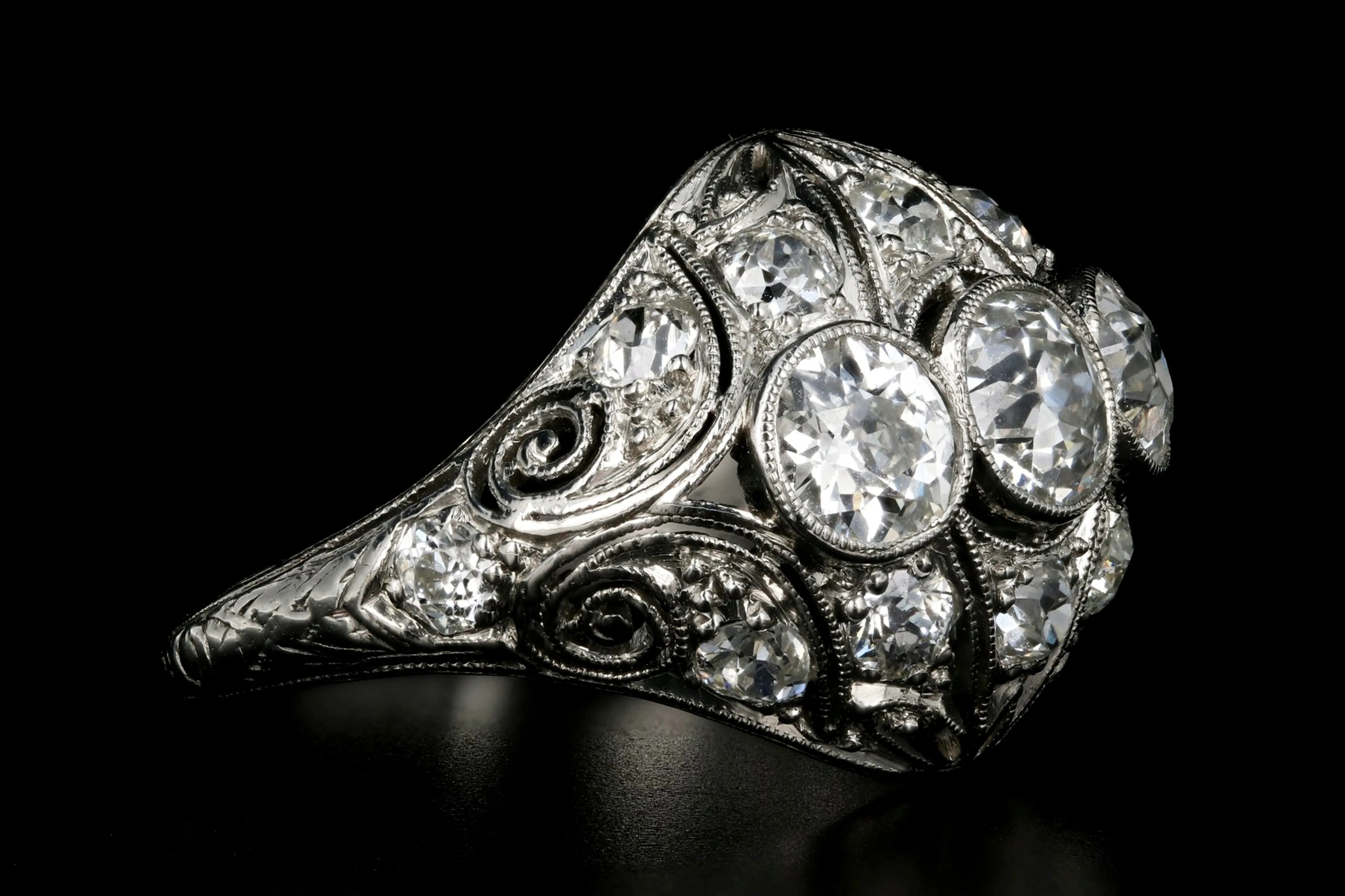 Art Deco Platinum 2.53 Carat Total Weight Three Stone Diamond Ring
