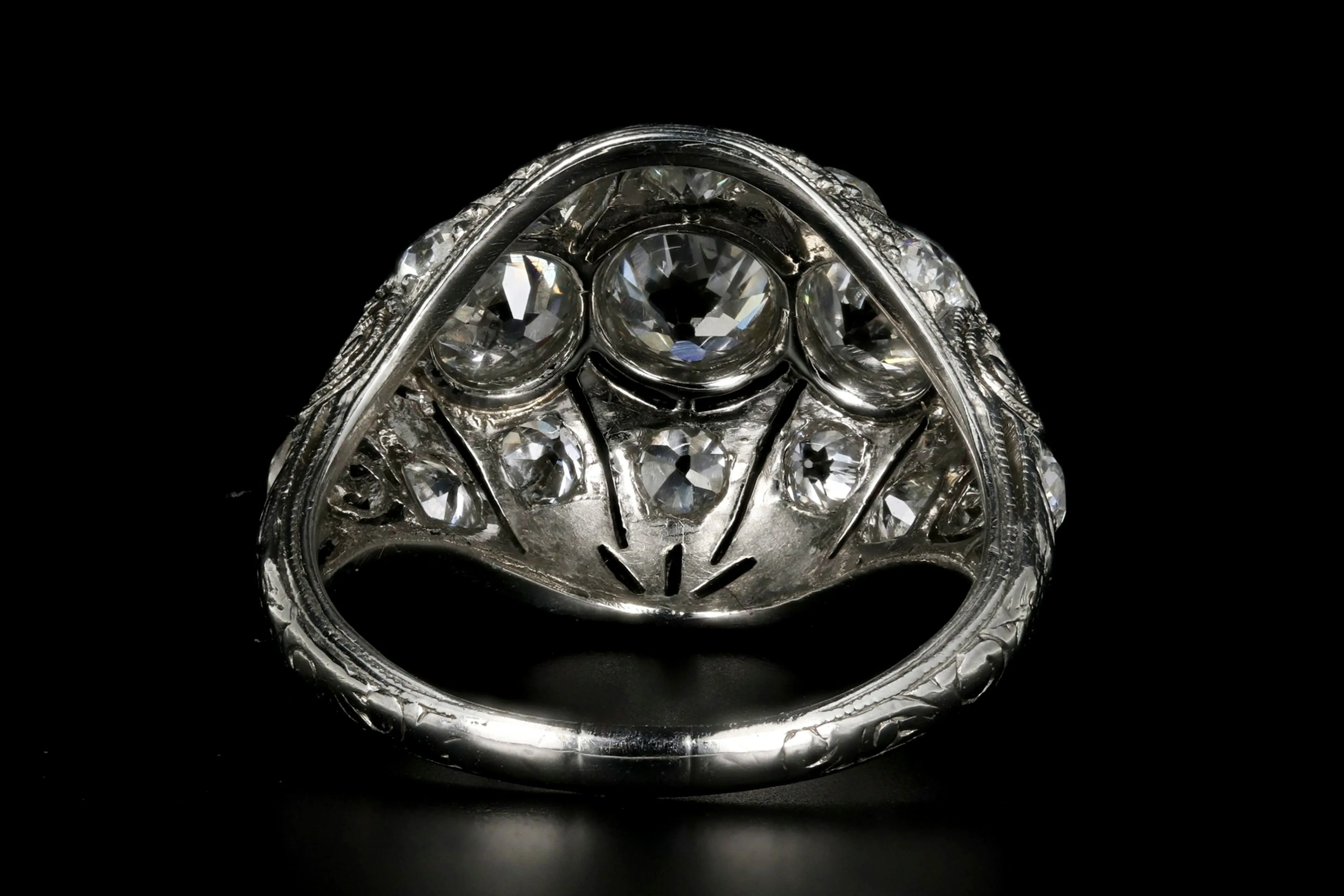 Art Deco Platinum 2.53 Carat Total Weight Three Stone Diamond Ring
