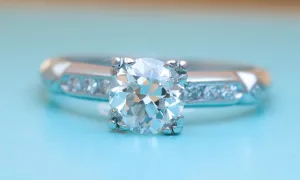 ART DECO PLATINUM OLD EUROPEAN CUT DIAMOND SOLITAIRE WITH ACCENTS