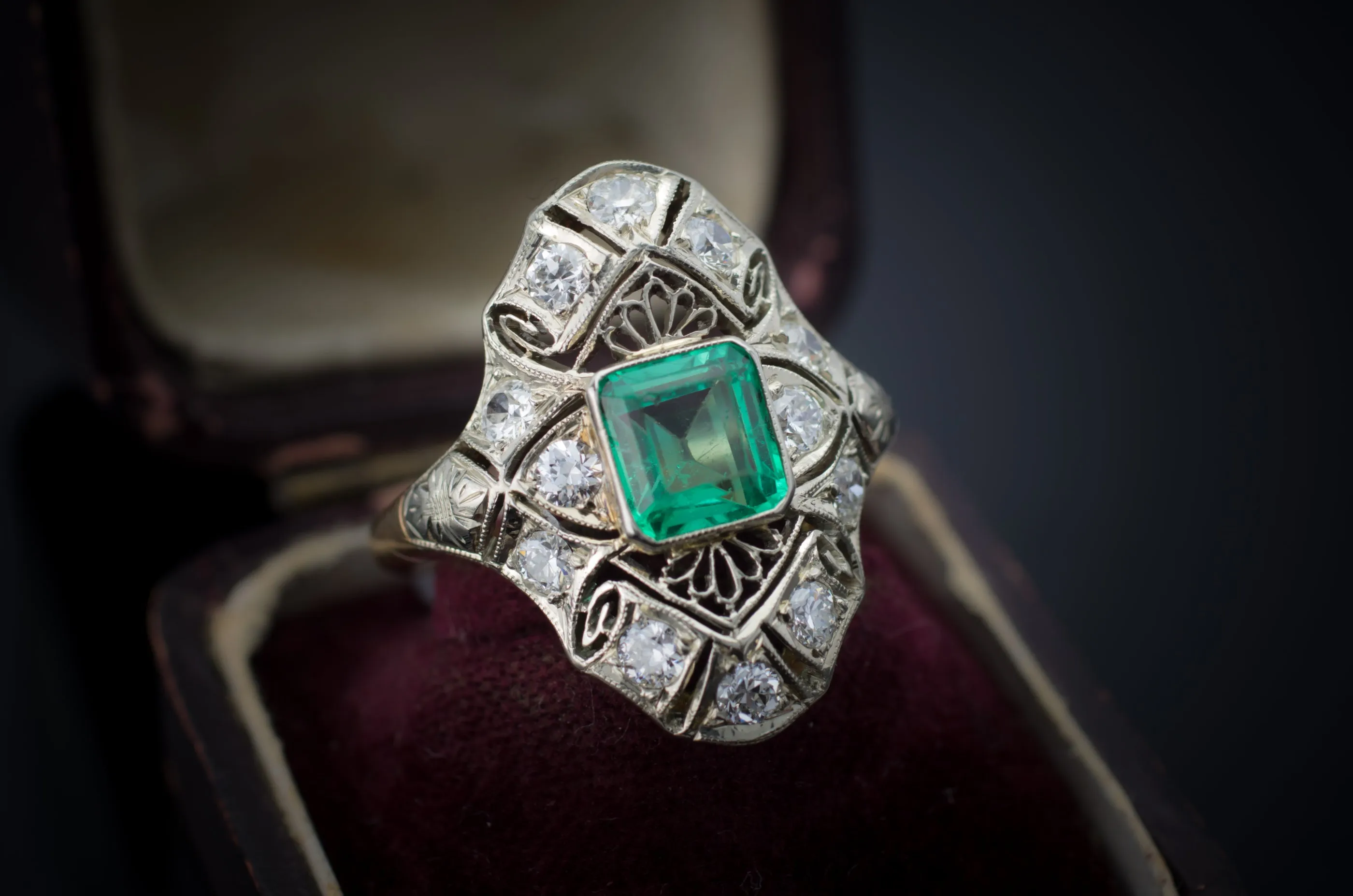 EMERALD AND DIAMOND NAVETTE SHAPE RING