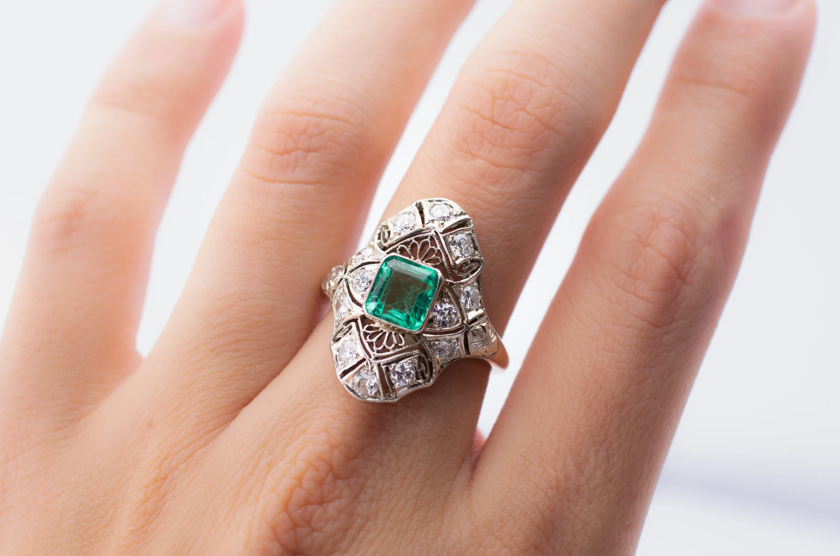 EMERALD AND DIAMOND NAVETTE SHAPE RING