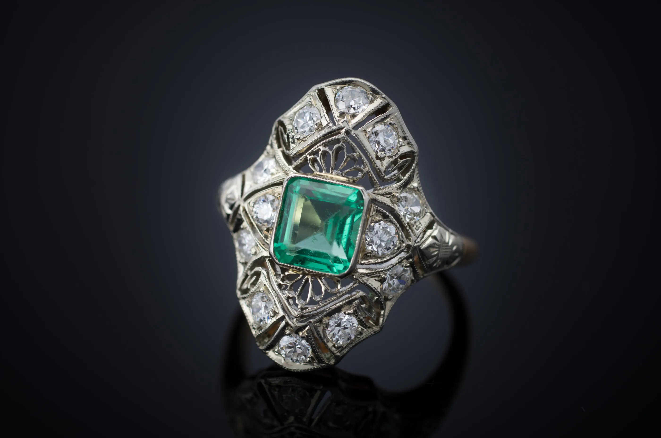 EMERALD AND DIAMOND NAVETTE SHAPE RING