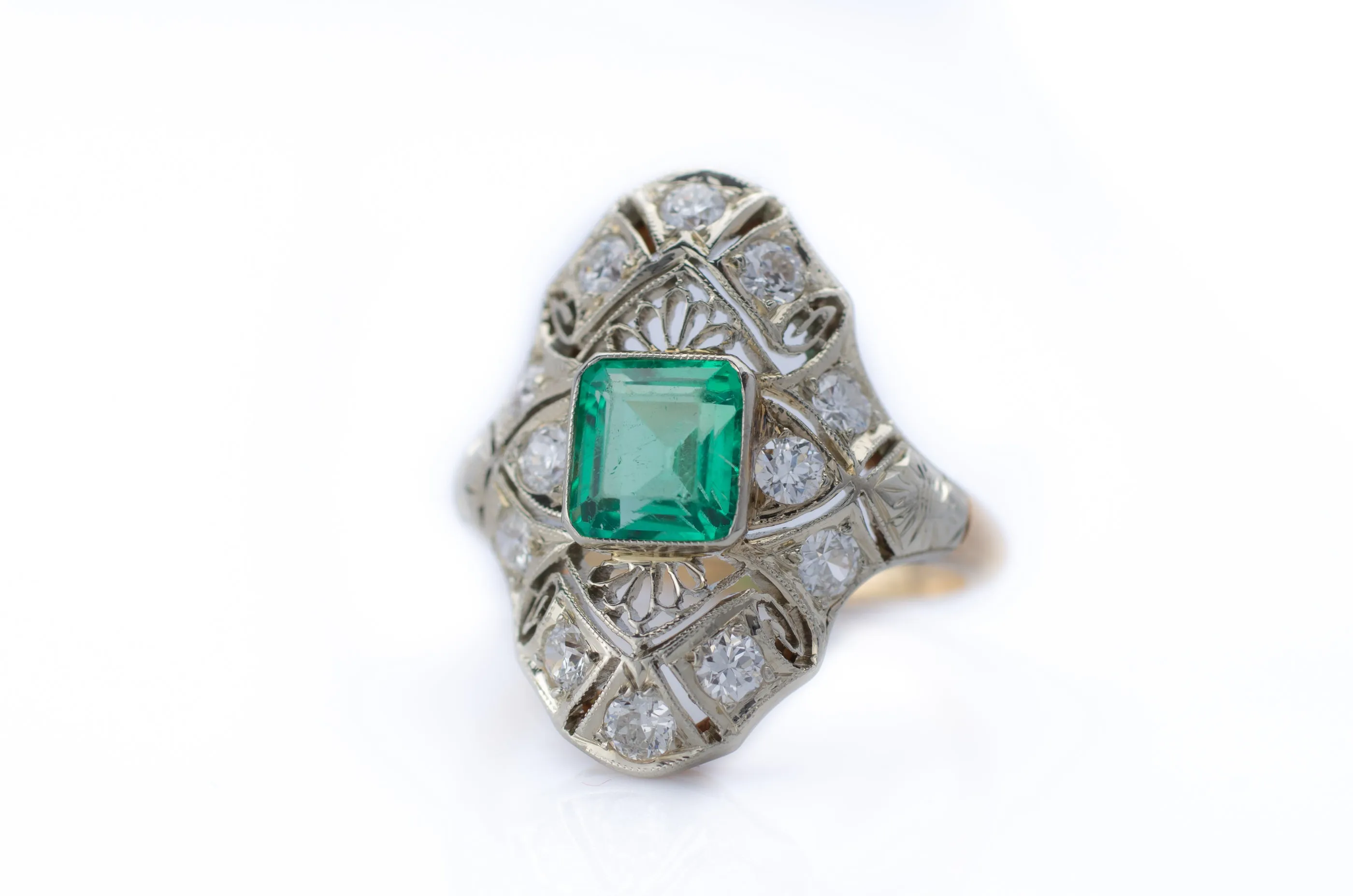 EMERALD AND DIAMOND NAVETTE SHAPE RING