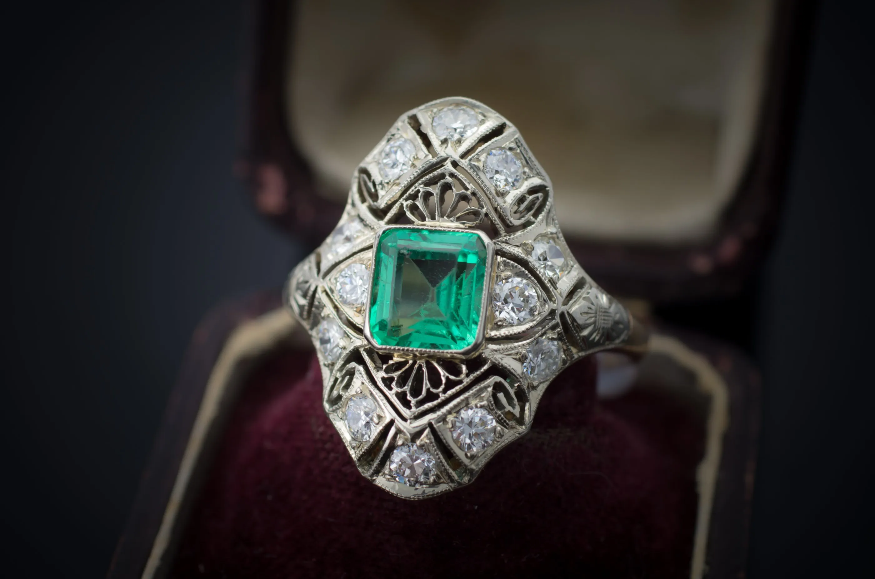 EMERALD AND DIAMOND NAVETTE SHAPE RING