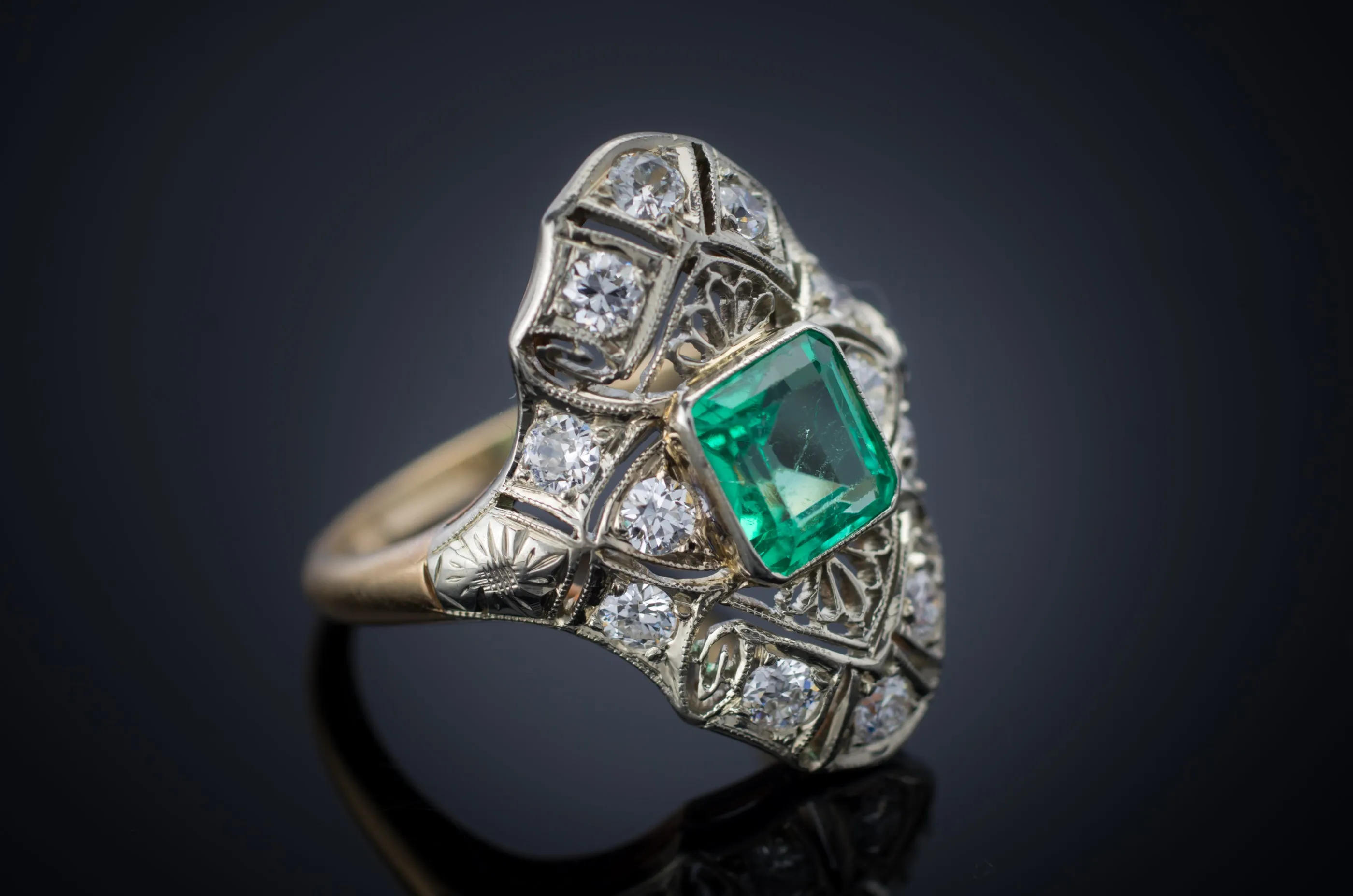 EMERALD AND DIAMOND NAVETTE SHAPE RING