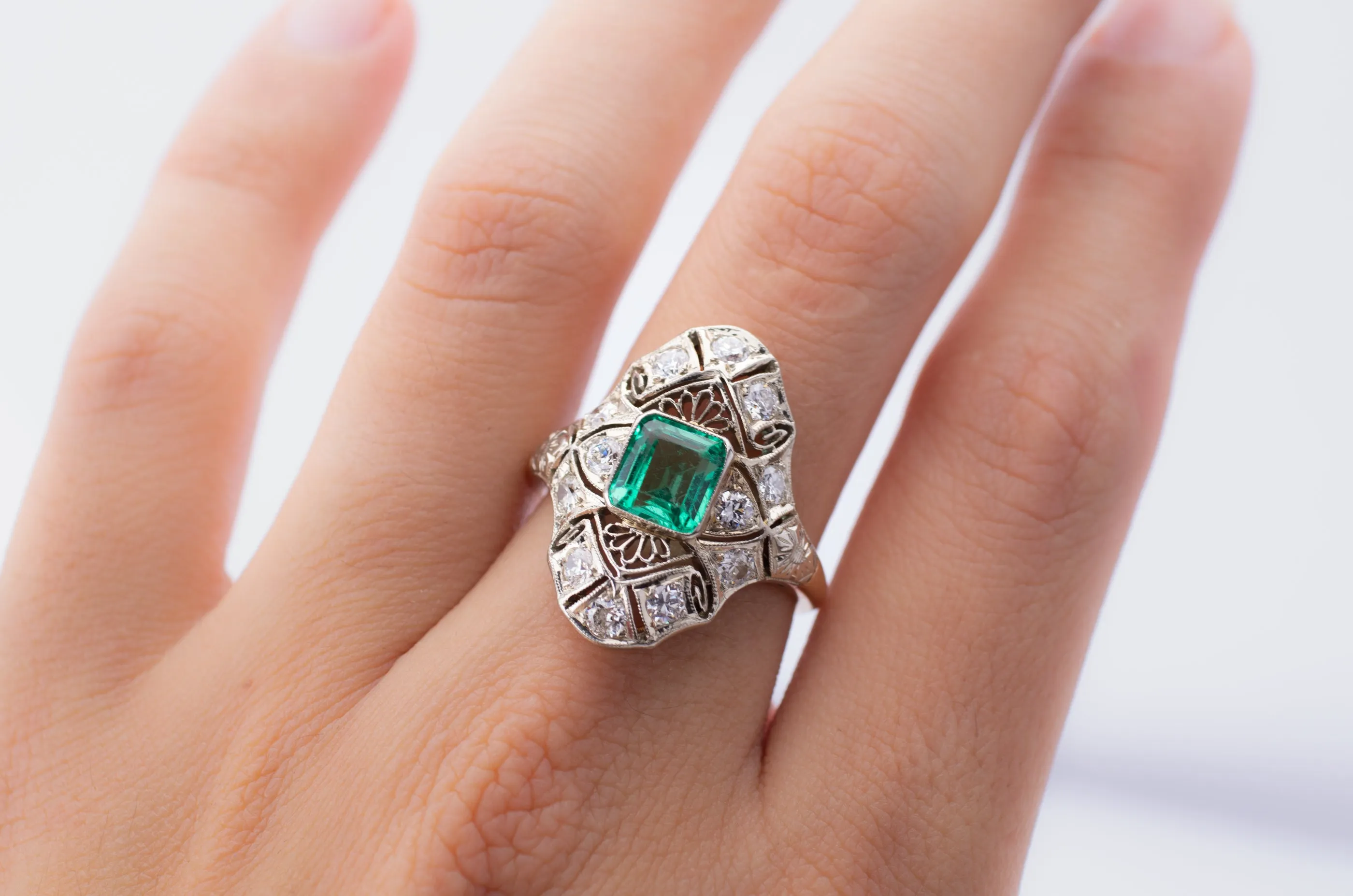 EMERALD AND DIAMOND NAVETTE SHAPE RING