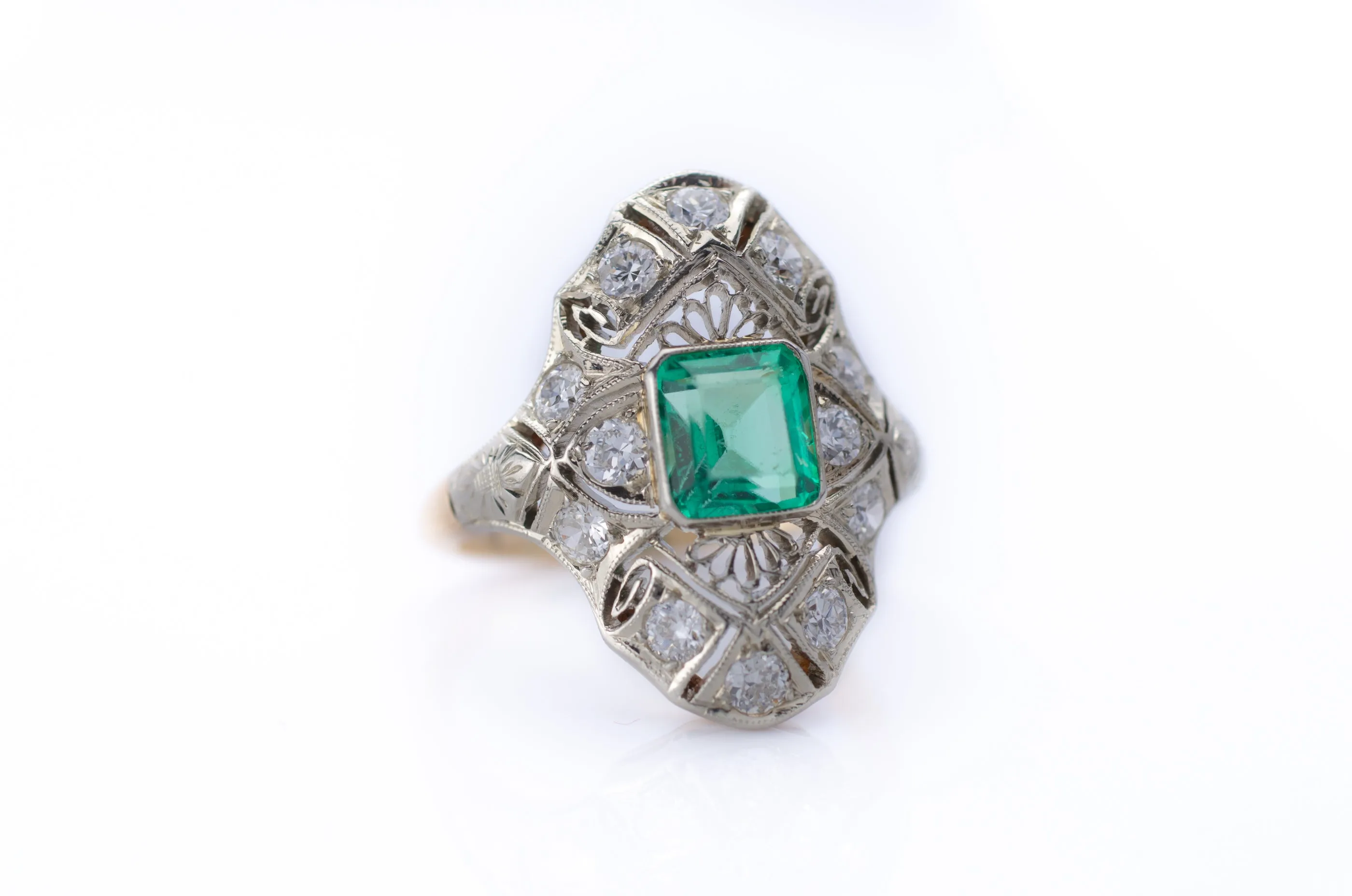 EMERALD AND DIAMOND NAVETTE SHAPE RING