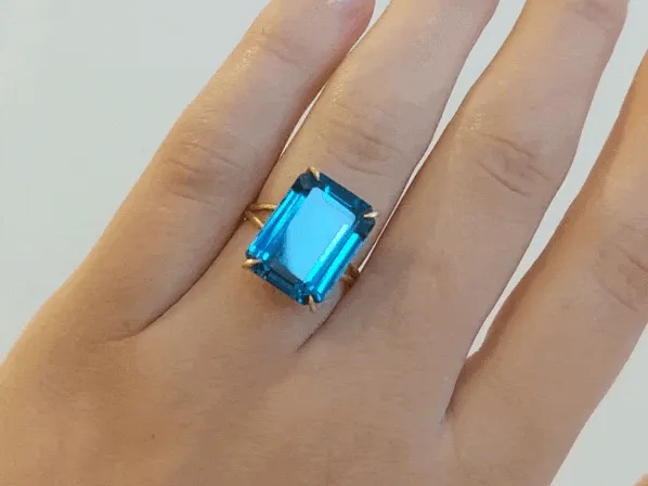 Gold and Emerald Cut London Blue Topaz Ring