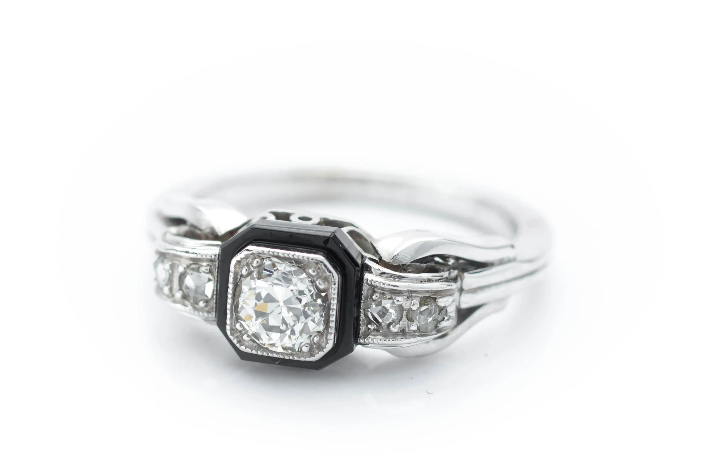 OLD EUROPEAN CUT DIAMOND RING WITH ONIX ACCENT