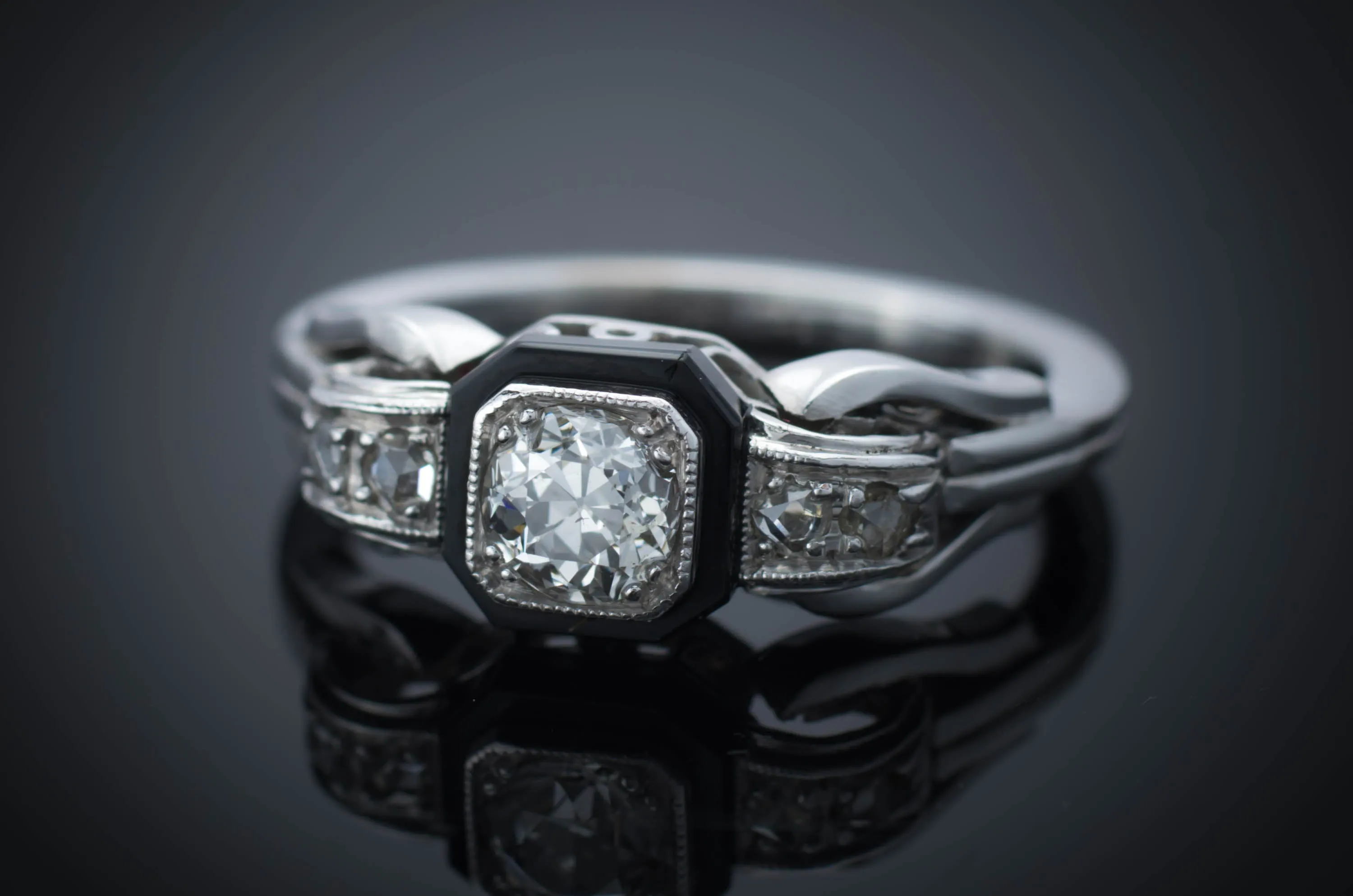 OLD EUROPEAN CUT DIAMOND RING WITH ONIX ACCENT