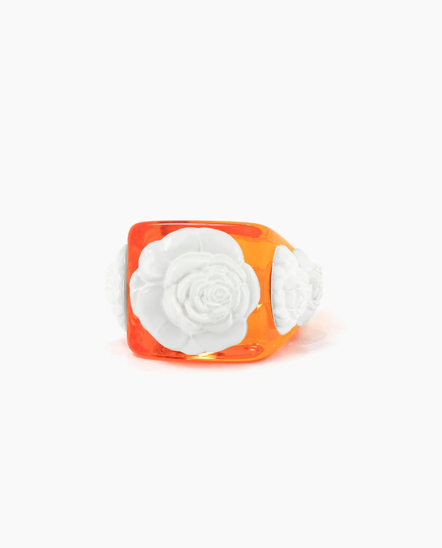 Orange crystal on White Rosetón