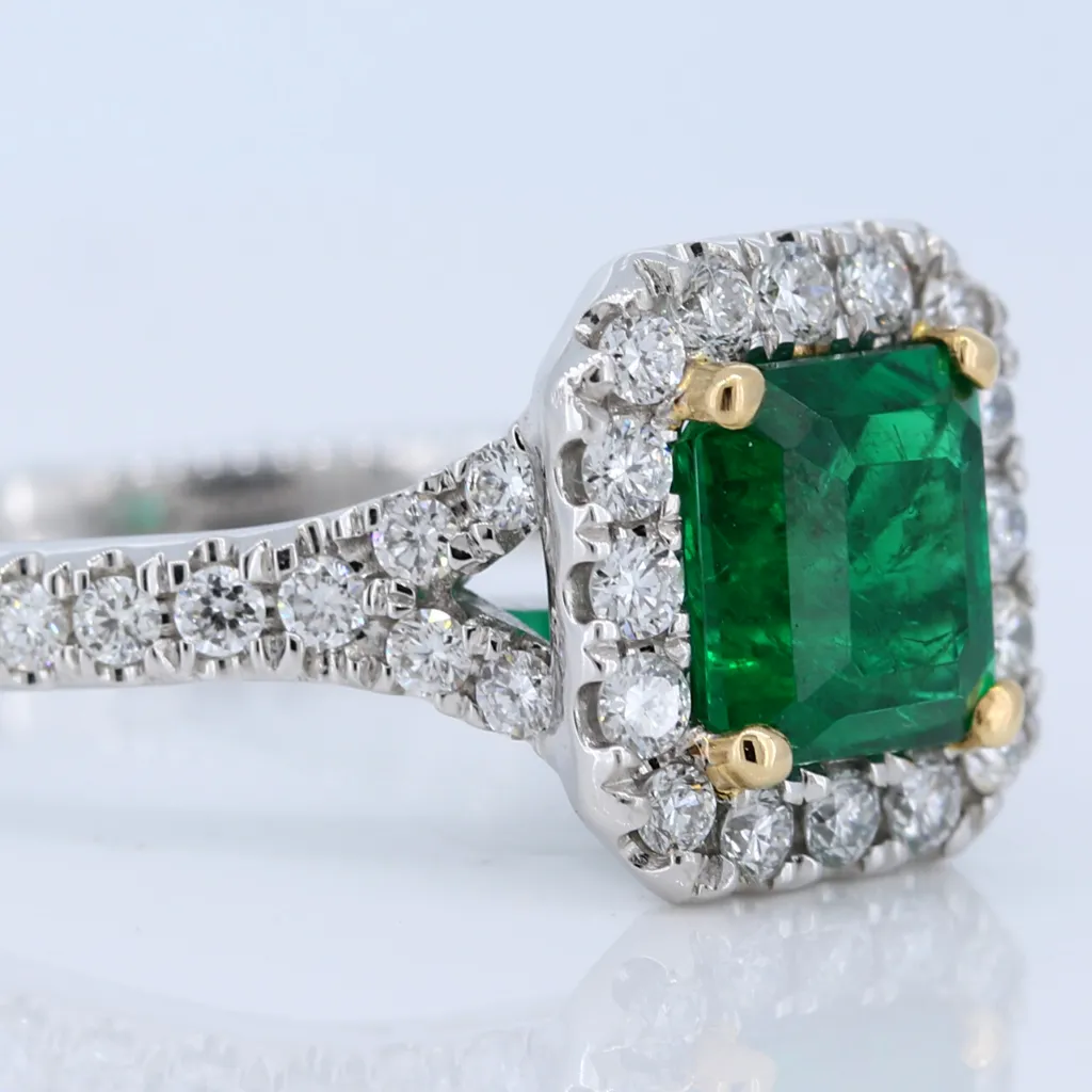 Platinum Ring with 1.38ct Emerald and .53ct diamonds