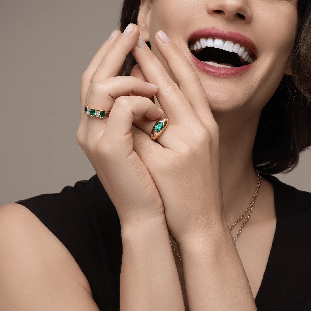 Sculpted Oval Emerald and Diamond Alternating Band