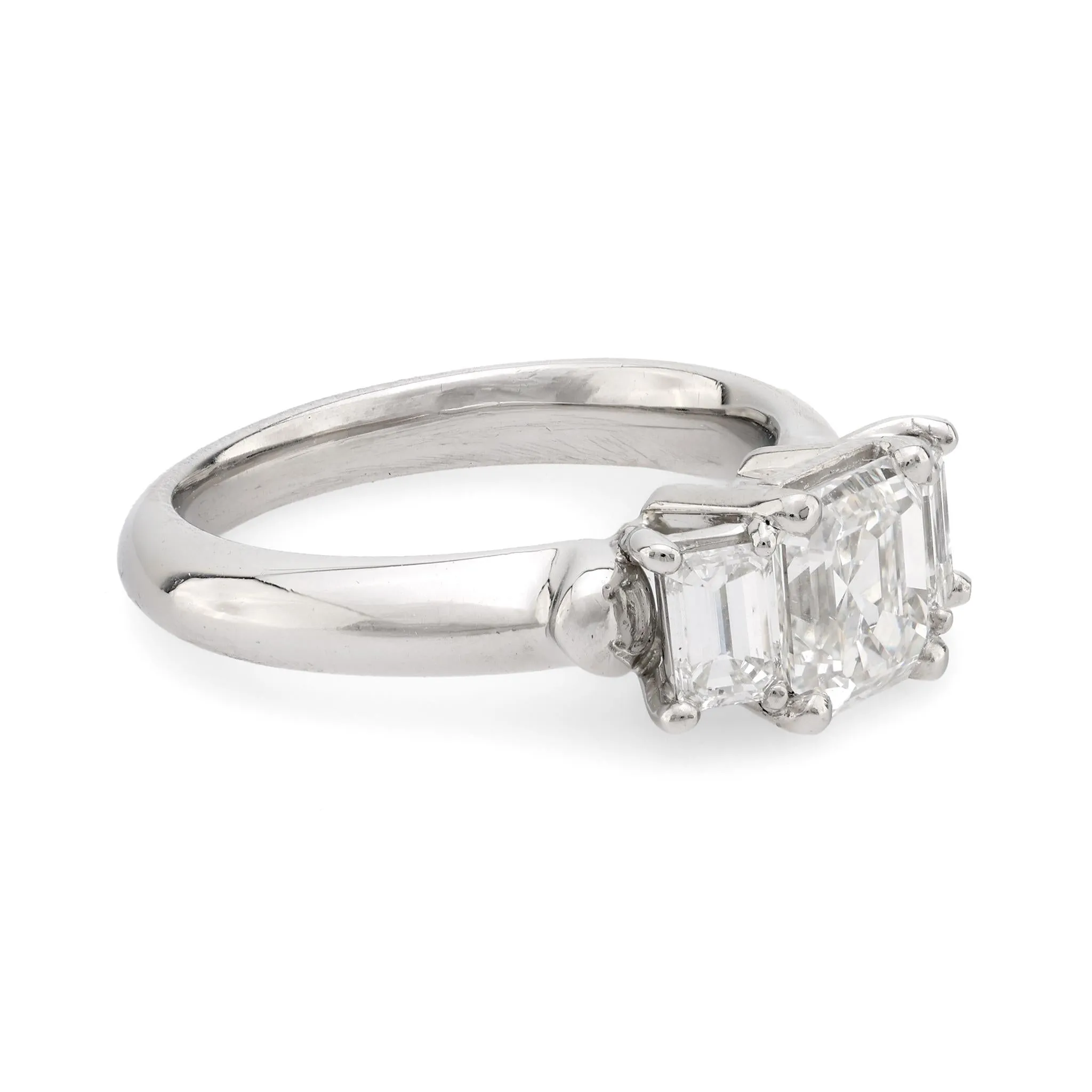 Vintage GIA emerald cut diamond platinum three stone ring